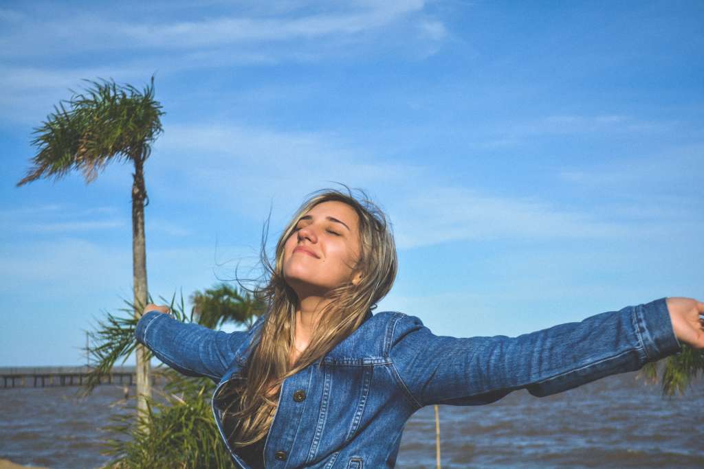 Woman happy from living a healthy lifestyle